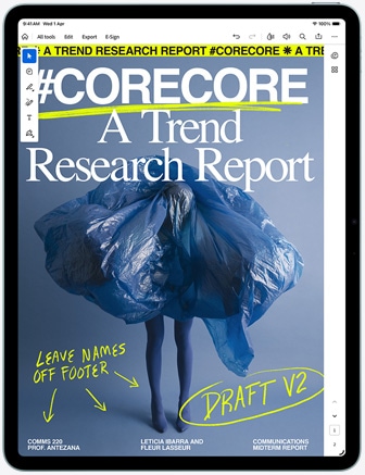 iPad Air, front exterior, displaying Adobe Acrobat PDF reader with design work in progress