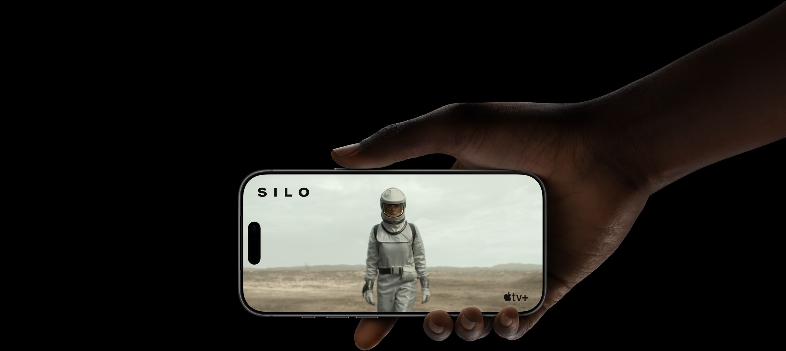 A scene from the Apple TV+ series Silo demonstrates the extended battery life of iPhone 17 Pro